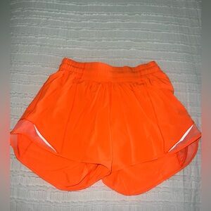 Lululemon neon orange shorts